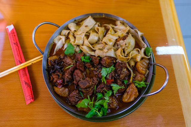 Spicy Big Tray Chicken ($18.95) with Huimei ($2.95) at New Spicy Village